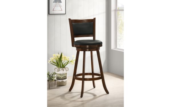 Romero Brown & Black Faux Leather Panel Back Bar Height Swivel Stool with plush black leatherette seat, wooden frame, angled legs, round footrest, and 360° swivel.