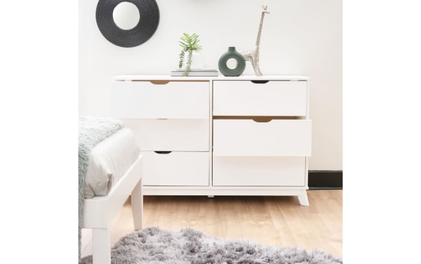 Phoebe White 6 Drawer Solid Wood Dresser in transitional style with solid pine frame, MDF drawers, cut-out handles, and a clean white finish.