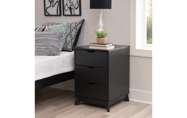 Phoebe Black 3 Drawer Nightstand in transitional style, made of solid pine and MDF, features three spacious drawers with cut-out handles and a sleek black finish.