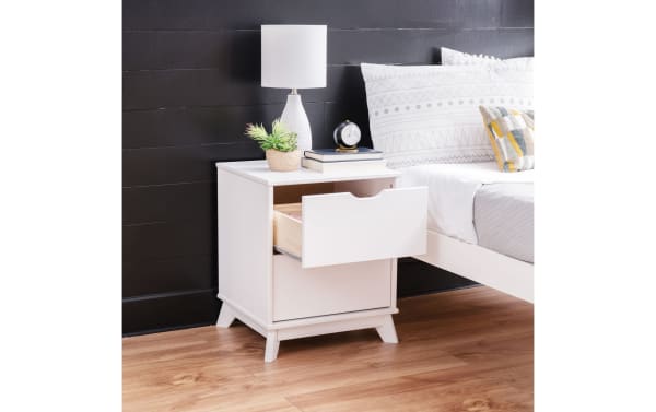Phoebe White 2 Drawer Nightstand in transitional style with solid pine and MDF construction, featuring two spacious drawers with cut-out handles in white finish.