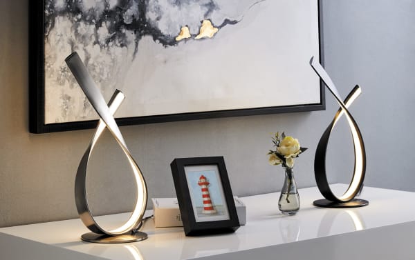 Cadiz Black LED Table Lamp with sleek black metal ribbon design and integrated LED lighting, ideal for contemporary modern home decor.