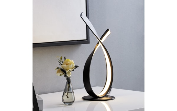 Cadiz Black LED Table Lamp in contemporary style with sleek black metal ribbon design and integrated warm LED lighting for modern decor.