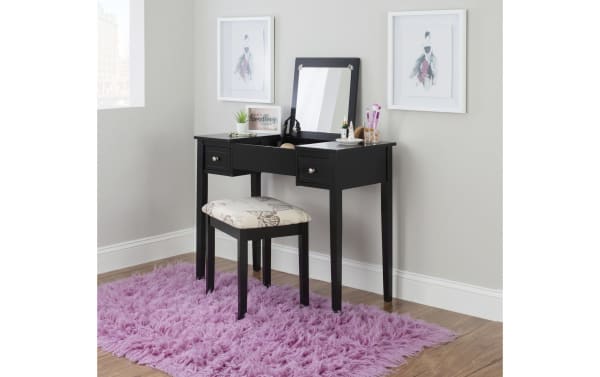 Vida Black 2 Drawer Vanity Set with beige butterfly-printed upholstered stool, solid rubberwood, MDF, plywood, traditional style, lift-top mirror, and storage drawers on a purple shag rug.