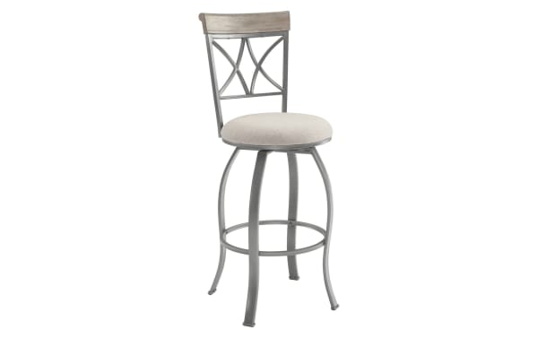 Homer Beige & Pewter Cross Back Bar Height Stool with beige polyester fabric seat, pewter steel frame, lattice backrest, swivel function, and circular footrest.