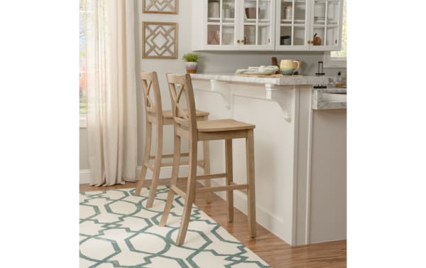 Natural Cross Back solid wood bar height stool in rustic finish, made of rubberwood solids and MDF, with clean lines and cross-back design, ideal for kitchen or formal settings.
