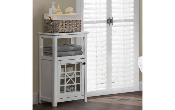 Austin 29'' White solid wood freestanding bathroom cabinet in transitional style, pine solids and MDF, with gridwork glass door and open shelf for towels.