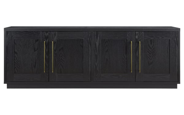 Syvia 68'' black transitional storage TV stand made of MDF with four paneled doors, brass handles, dual-level closed cabinet shelving, and cord management.
