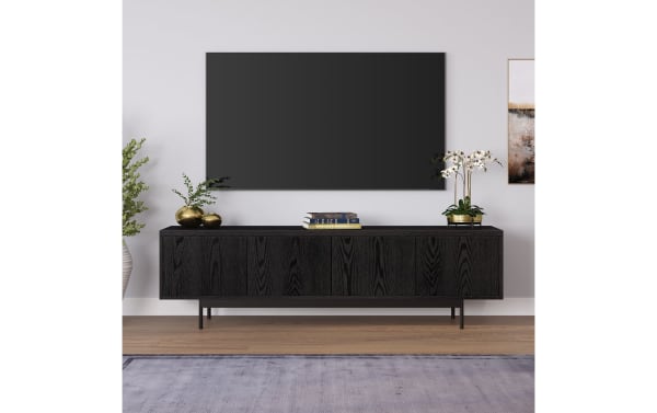 Charlene 70'' black transitional TV stand with MDF wood and metal legs, featuring four enclosed storage cabinets and cable management.