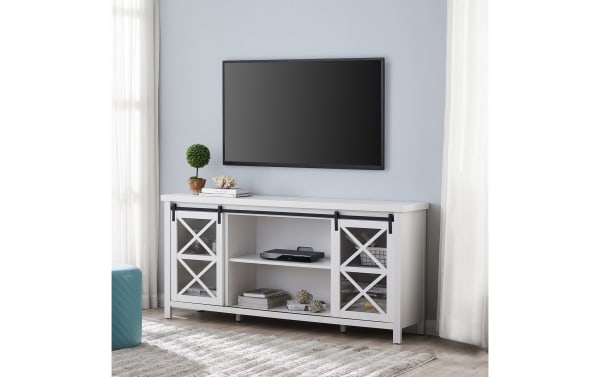 Brayland 68'' White Storage TV Stand in contemporary style with MDF and metal construction, featuring sliding barn doors and six shelves for living room organization.