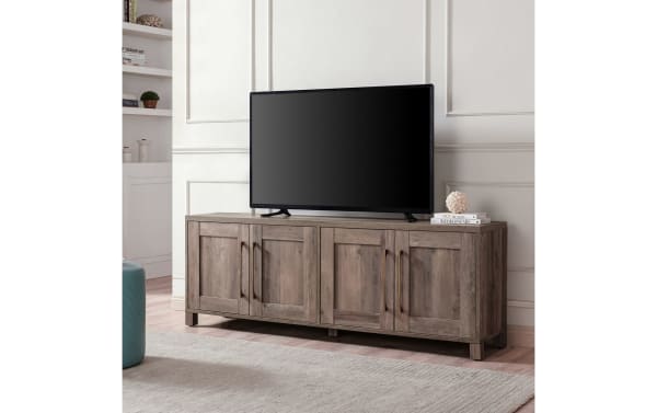 Zion 68'' Gray Storage TV Stand in transitional style with sturdy MDF frame, two enclosed cabinets, six shelves, and space for TVs up to 65''.