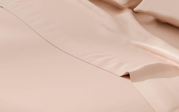 Blush pink MyBob's King Blush Cozy Cotton 2 Piece Pillowcase Set in traditional style, made from soft, breathable 100% cotton fabric with antimicrobial protection.