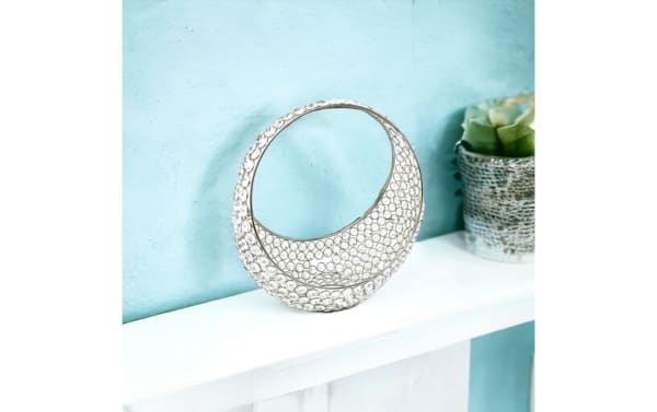 13'' Elegance Silver Glam Basket with round ring shape, handcrafted iron frame, and sparkling faux crystals, featuring a mirrored base for modern decor.