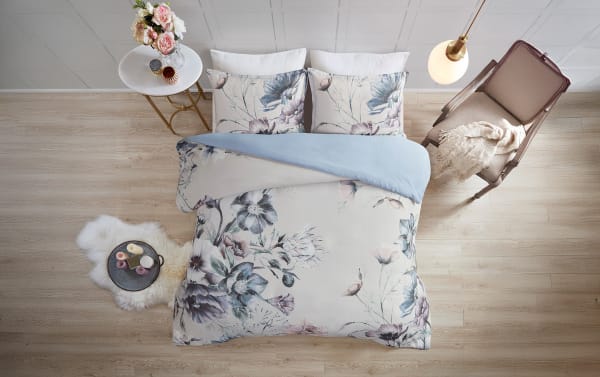 Emily King California King Light Blue Floral 3-piece duvet cover set with traditional multicolored cotton and polyester fabric, featuring a romantic garden floral design on white and light blue background.