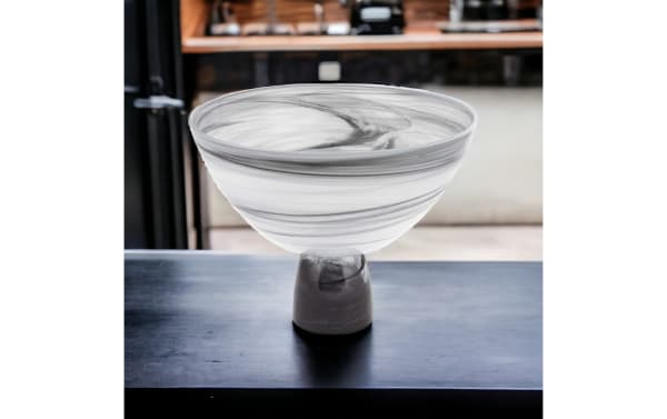 10'' Arezzo mouth-blown gray glass bowl with footed base, contemporary style, alabaster glass featuring swirling black pattern for unique decor.