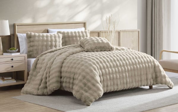 Taupe Olivia Twin/Twin XL 3-piece comforter set with ruched faux fur texture, soft polyester fabric, and contemporary tan design for cozy bedding.