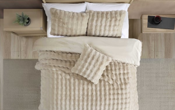Taupe Olivia Twin/Twin XL 3-piece comforter set with ruched faux fur polyester fabric, featuring plush pillows and cozy contemporary tan bedding.