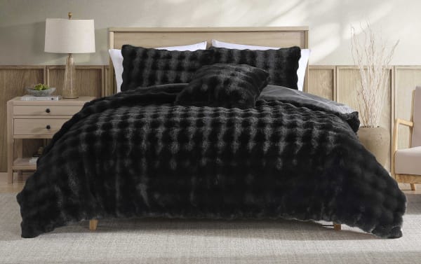 Olivia Full/Queen Black 4 Piece Comforter Set with ruched faux fur polyester fabric, contemporary style, soft plush texture, and matching pillows.