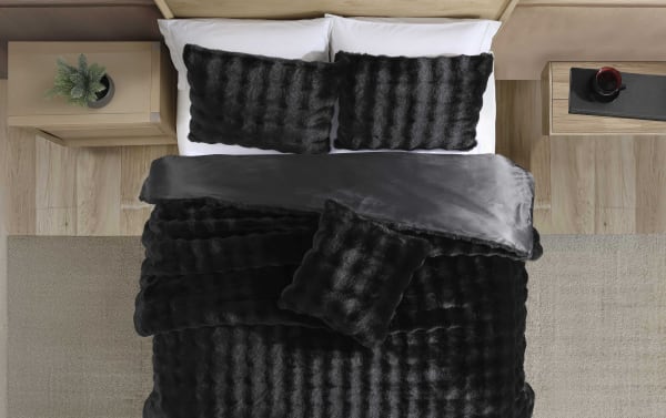 Olivia Full/Queen Black 4 Piece Comforter Set with ruched faux fur texture, soft polyester fabric, contemporary style, includes comforter and matching pillows.