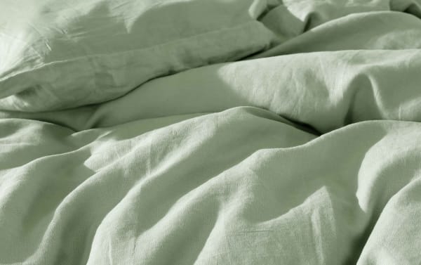 Weston Twin Sage 3 Piece Comforter Set in green linen and polyester fabric, featuring a soft, transitional style with a cozy, textured surface.