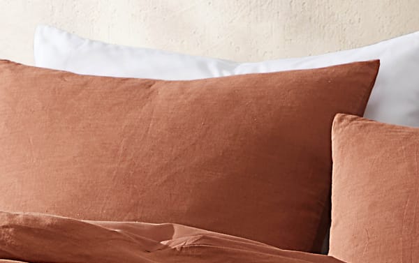 Weston Orange 4 Piece Queen Comforter Set with soft orange linen and polyester fabric, transitional style pillows and comforter for cozy bedding.