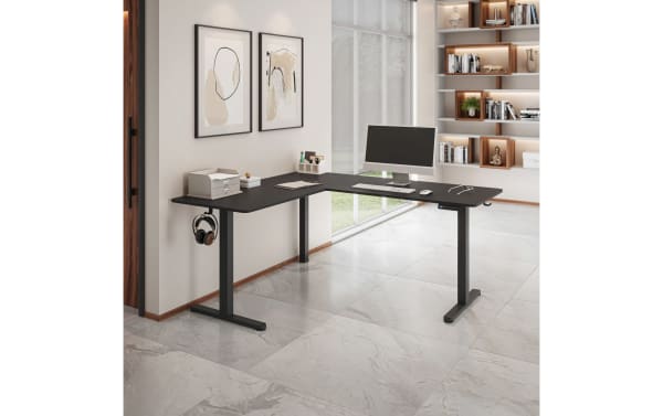 Ailyn Black 63'' L-Shaped Adjustable Height Desk with particle board top and steel frame, featuring electric lift and programmable memory presets for ergonomic workspace.