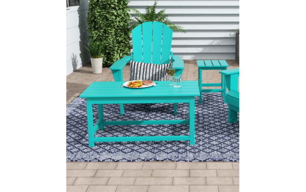 Turquoise Paloma Adirondack coffee table in high-density plastic with slatted top, sturdy contemporary outdoor patio furniture piece.