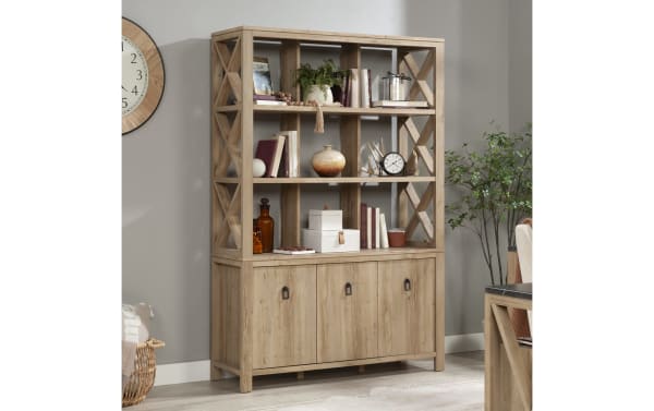 Genevieve 70.2'' light brown rustic 5-shelf bookcase with trellis design, wood grain finish, 3-door cabinet storage, and adjustable shelves.