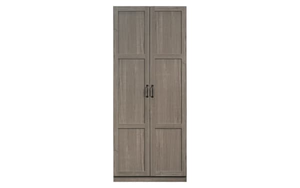 Rustic Bella Gray 2 Door Storage Cabinet made of metal and particle board with four adjustable shelves, featuring paneled gray wood doors and black handles.