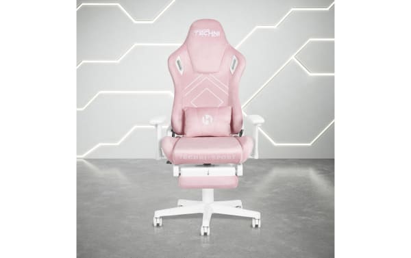 Aria Pink Gaming Chair by Techni Sport, transitional style with pink fabric upholstery, white nylon base, steel frame, ergonomic design, adjustable armrests, reclining backrest, built-in headrest, lumbar cushion, and fold-away footrest for comfort and performance.