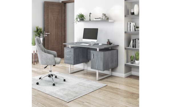 Contemporary Avalon Gray 2 Drawer Desk with floating MDF top, steel track legs, two drawers, file cabinet, and spacious workspace in gray finish.