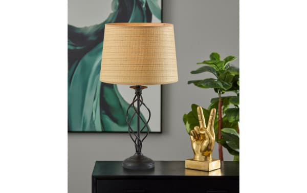 Contemporary Mirza Natural & Black Table Lamp with beige PE rattan shade and sleek black metal open spiral base, tan color group.