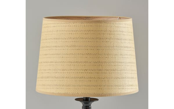 Beige Mirza Natural & Black Table Lamp with tan PE rattan shade and sleek metal base, showcasing contemporary style and natural woven texture.