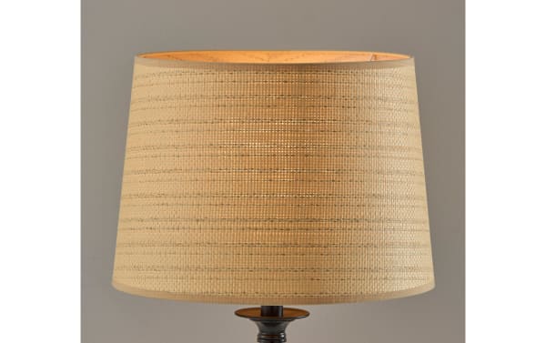 Contemporary Mirza Natural & Black Table Lamp with beige PE rattan shade and sleek metal spiral base, tan color, modern home lighting design.