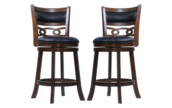 Set of two wooden bar stools with dark brown finish, black cushioned leather seats and backs, featuring decorative cutout design and footrests.