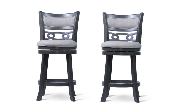 Set of 2 Christel Gray Upholstered Swivel Counter Height Stools with carved backrest, gray polyester fabric, rubberwood frame, and 360-degree swivel.