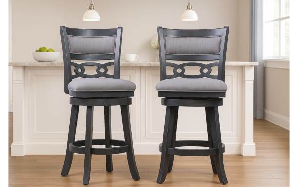 Set of 2 Christel Gray Upholstered Swivel Counter Height Stools with carved backrest, gray polyester fabric, rubberwood frame, and 360-degree swivel in transitional style.