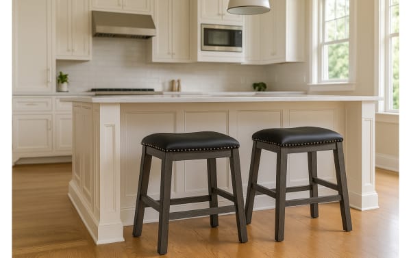 Set of 2 Polly Black & Gray faux leather backless counter height stools with nailhead trim, rubberwood solid legs, and transitional style seating.