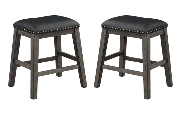 Set of 2 Polly black and gray transitional backless counter height stools with faux leather upholstery, nailhead trim, and wire-brushed acacia veneer legs.