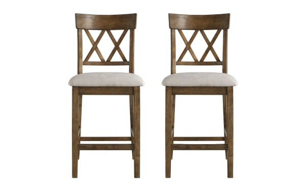Set of 2 Andie Light Oak Cross Back Upholstered Counter Height Stools in gray polyester fabric with padded seats, rubberwood frame, and classic double X-back design.