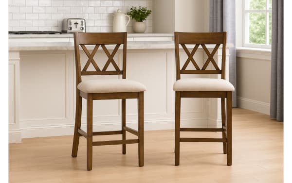 Set of 2 Andie Light Oak Cross Back Upholstered Counter Height Stools in gray polyester fabric with padded seats, rubberwood frame, and transitional style.