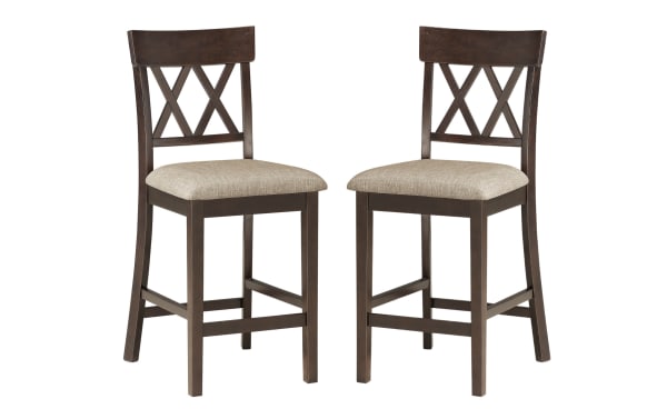 Set of 2 Andie Dark Brown Cross Back Upholstered Counter Height Stools with tan polyester fabric seats, rubberwood frame, and transitional double X-back design.