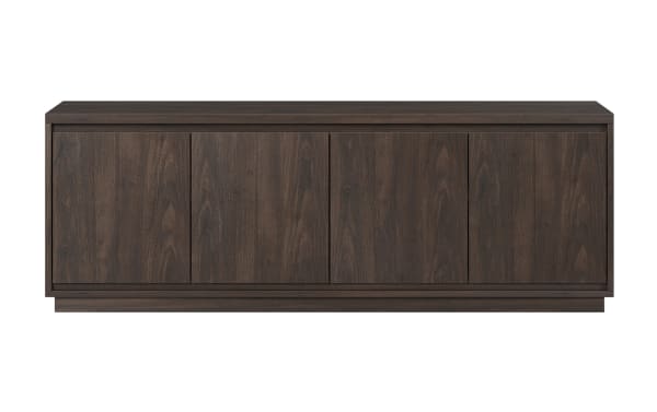 Dark brown wood TV stand with four paneled cabinet doors, minimalist design, and a flat top surface for media devices or decor.