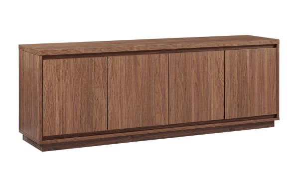 Modern wooden sideboard cabinet with four doors, walnut finish, minimalist design, flat top surface, and recessed base for living room storage.