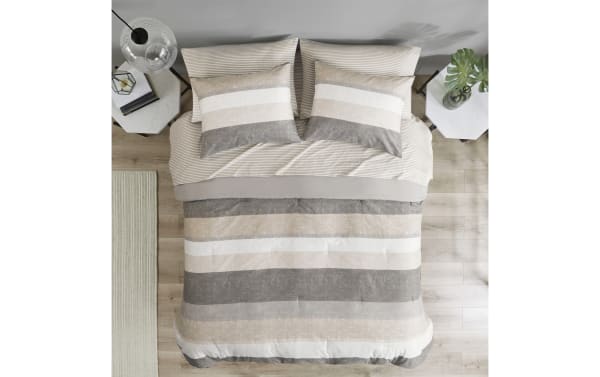 Santos King Taupe 7 Piece Striped Comforter Set with taupe, gray, light gray, and white polyester fabric in contemporary tan-striped design for king beds.