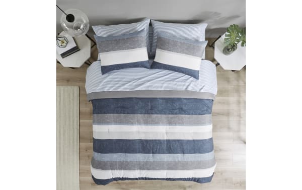 Santos Queen Blue 7 Piece Striped Comforter Set in polyester fabric with contemporary blue, light blue, gray, and white horizontal stripes for stylish bedroom comfort.