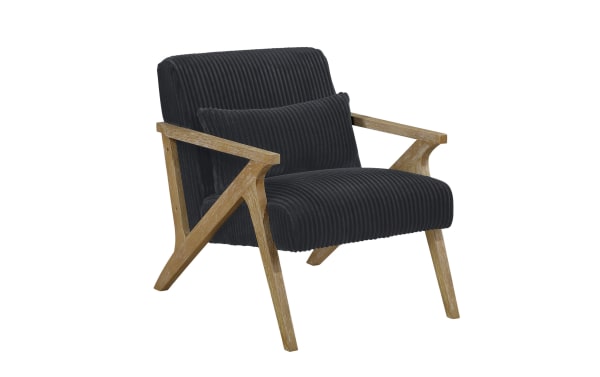 Baylor Black Accent Chair with mid-century modern design, black polyester fabric upholstery, natural distressed wood frame, and included lumbar pillow for comfort.