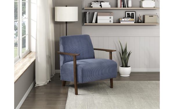 Rosie Blue Accent Chair in mid-century modern style with blue polyester fabric upholstery, solid wood legs, and high-density foam seat for comfort.