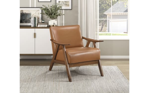 Kane Brown & Walnut Faux Leather Accent Chair in mid-century modern style with brown faux leather upholstery, solid rubberwood frame, and angled wood arms.
