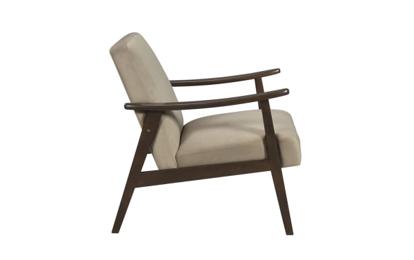 Mid-century modern Rudy Light Brown Accent Chair with beige velvet upholstery, solid wood frame, and angled armrests for stylish comfort.