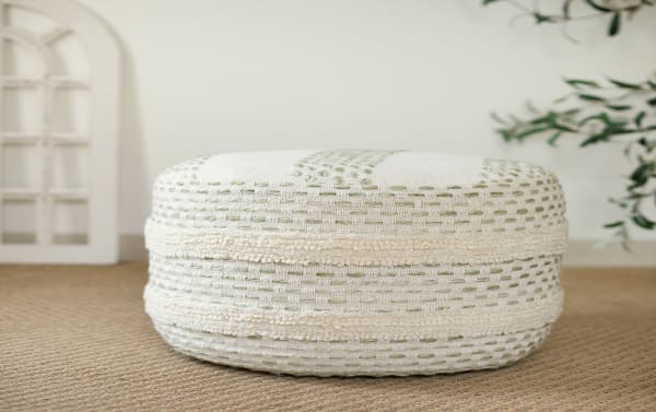 Jeff Sage Pouf in light green and ivory farmhouse style, handcrafted with 100% cotton fabric and wool, featuring geometric overtufting patterns.